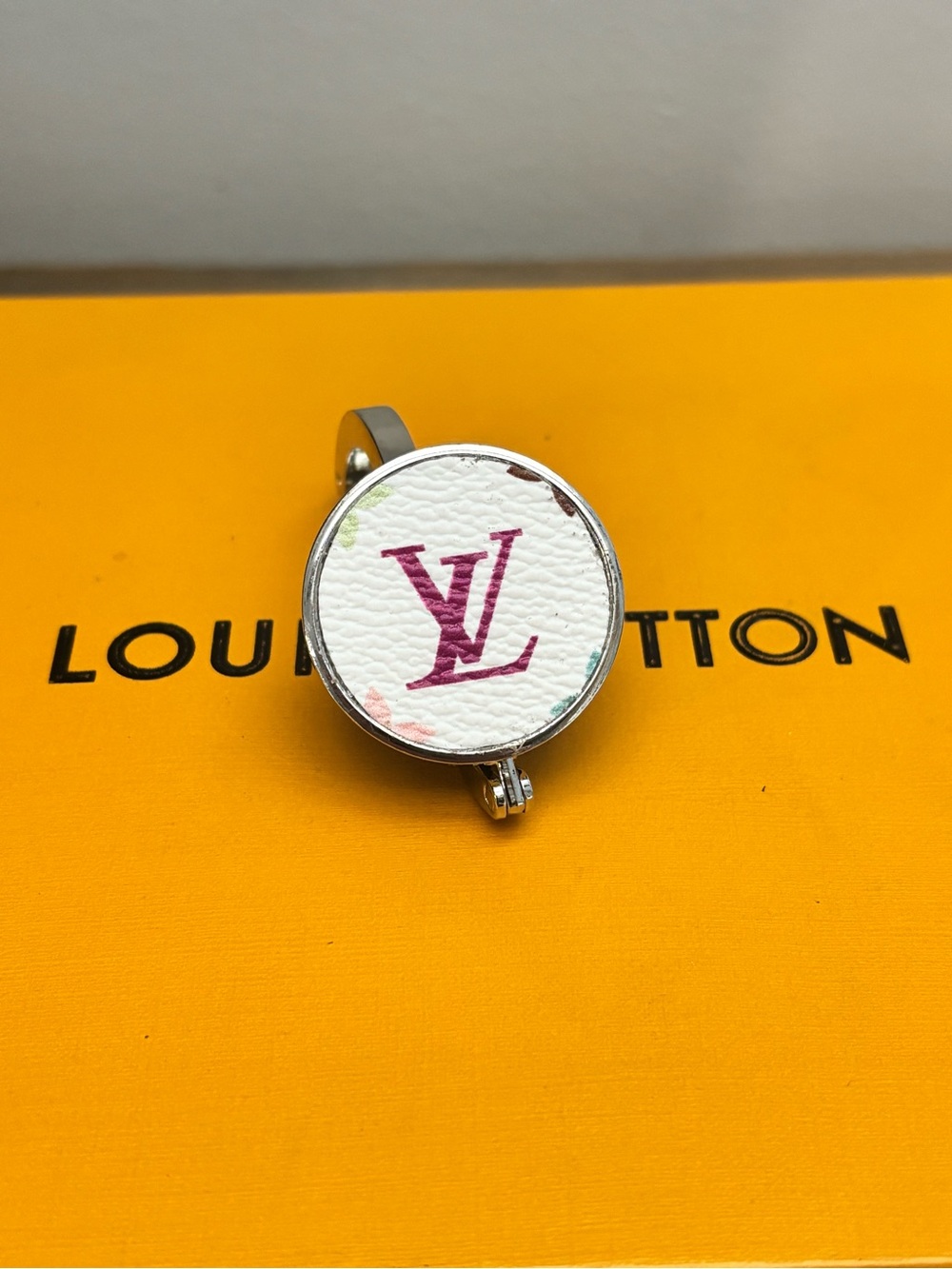Louis Vuitton Glossy Handbag
Bag Purse Hanger Hook Holder, Silver Tone LV